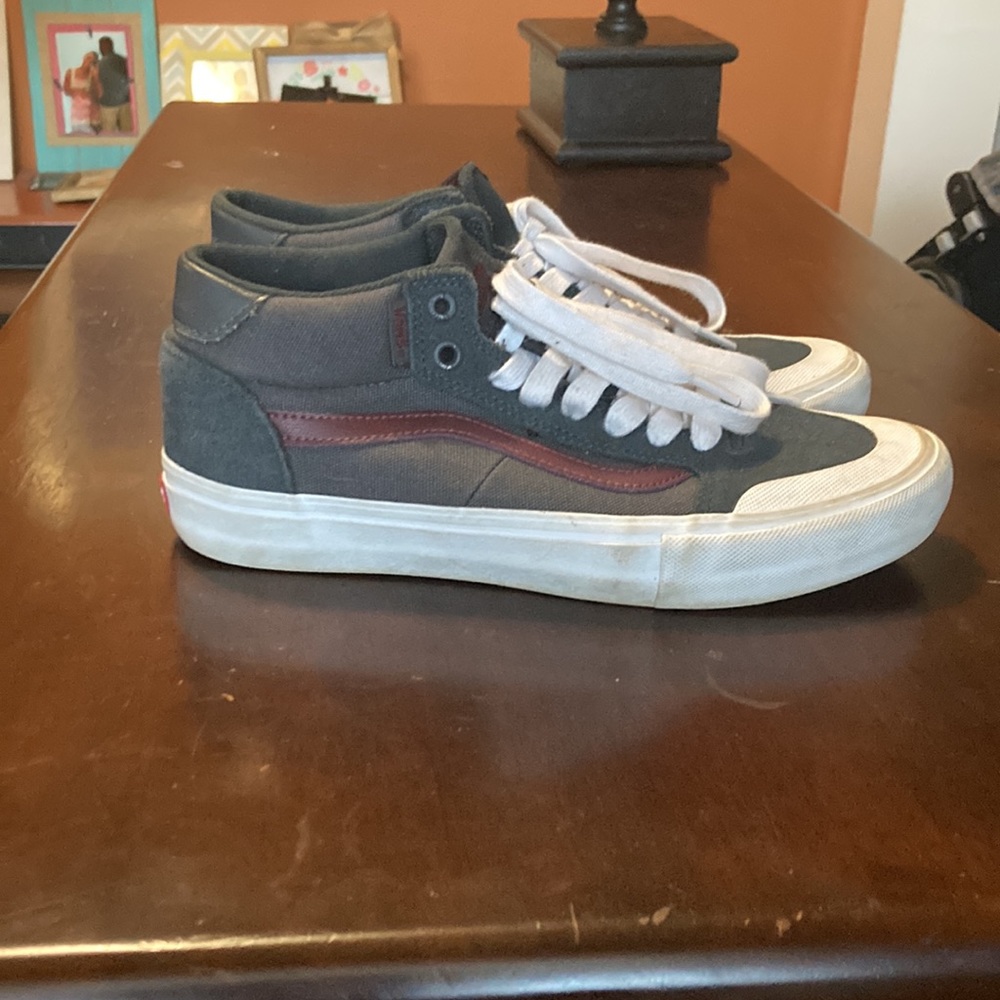 White, black and maroon vans